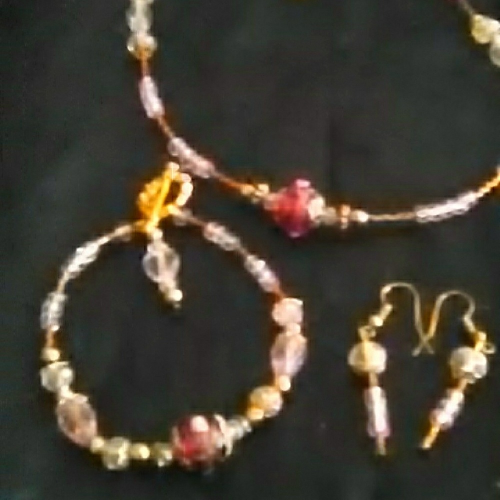 Gold and pink and crystal beaded necklace with mat